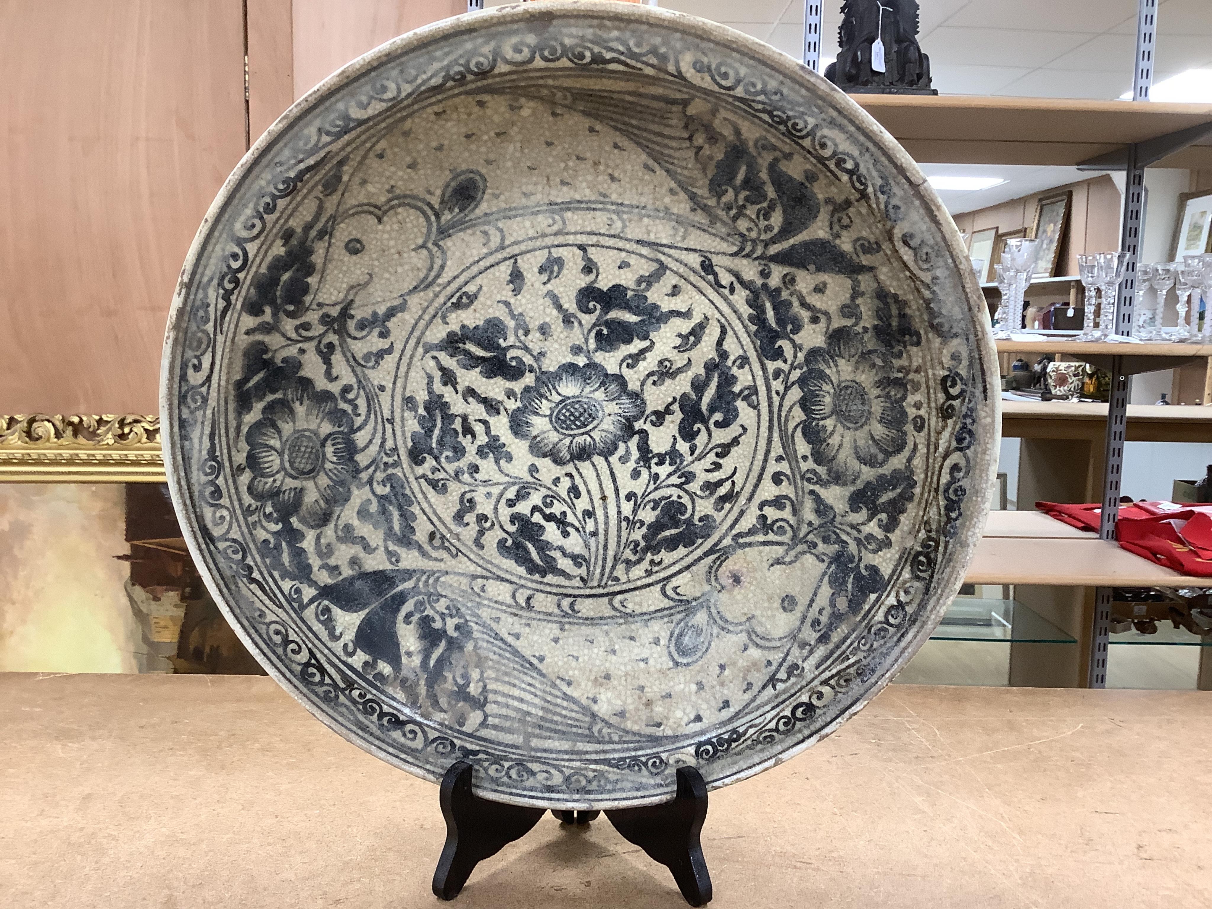 A group of Thai ceramic dishes, possibly Sukothai, largest 36cm